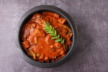 Kerala fish curry coconut milk gravy , cooking spicy Goan fish curry , Indian red fish curry Bengali fish curry in coconut milk Kolkata, India Sri Lanka. Lankan food.