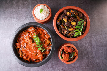 Kerala fish curry coconut milk gravy , cooking spicy Goan fish curry , Indian red fish curry Bengali fish curry in coconut milk Kolkata, India Sri Lanka. Lankan food.