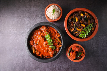 Kerala fish curry coconut milk gravy , cooking spicy Goan fish curry , Indian red fish curry Bengali fish curry in coconut milk Kolkata, India Sri Lanka. Lankan food.