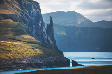landscape with cliffs by the ocean at faroe islands