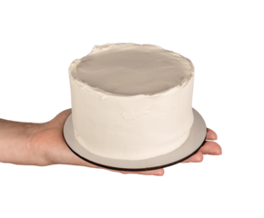 Hand holding blank bento cake mock up, mini birthday dessert on palm isolated on white background