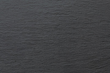 abstract background of black slate texture close up
