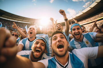 Argentine soccer fans supporters in stadium - obrazy, fototapety, plakaty