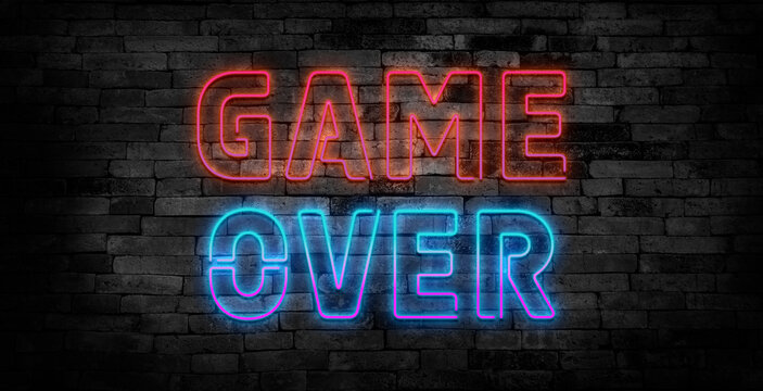 Game Over Neon Text Vector with a Brick Wall Background design template modern trend design night neon signboard night bright advertising light banner light art. Vector Illustration.