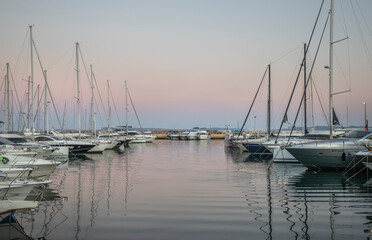 Fototapeta premium View of the yachts in the seaport in the old town Le Lavandou, France