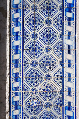 Old Medieval Azulejo Tiles on Building Wall in Alfama District, Lisbon, Portugal. - 709145525