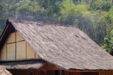Fototapeta na wymiar the concept of an environmentally friendly Baduy house roof, made from sago leaves and palm fiber