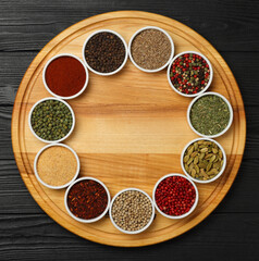 Circle of assorted spices in bowls