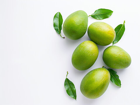 Fresh green tropical mangoes isolated on white background. Minimalist style. 
