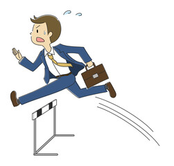 ハードルを越えるビジネスマン