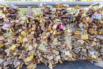 Multitude of padlocks attached to bridge, representing love and togetherness. Bridge of Love, Vrnjačka Banja, Serbia.