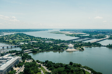 High angle view of Washington D.C. featuring the Jefferson Memorial and Ronald Reagan Washington National Airport.