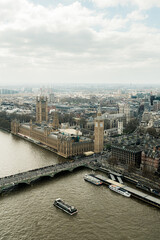 High angle view of Big Ben, the Houses of Parliament, and Westminster Bridge in London, England.