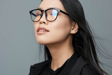 Fototapeta premium Woman business smile face attractive beautiful portrait asian fashion studio glasses beauty background student cute