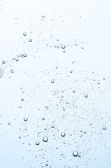 The texture of a cosmetic serum with bubbles in closeup. Macrophotography