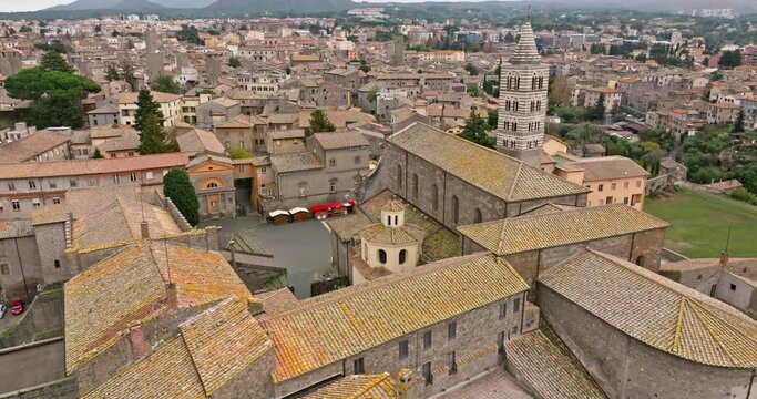 Aerial view architecture cityscape Viterbo Italy. The central antique square with an old castle on the historical streets of the tourist town. High quality 4k footage