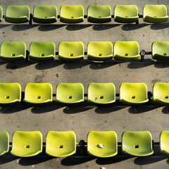 grüne Sitze in einem Stadion © Fabian