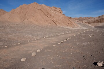 Sandy Rocky scenery in The Valley of The Moon (‎⁨Valle De La Luna) ⁩, ⁨San Pedro de Atacama⁩, ⁨Chile.⁩