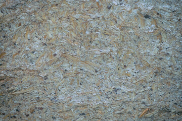 Photo of pressed wood, wood chips texture, decoration of joiner. Texture of old pressed wood chips. 