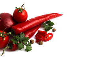  Vegetables with herbs lie on a white background.