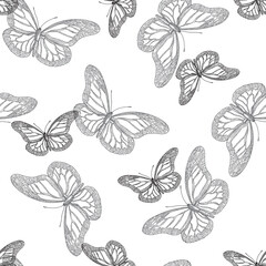 Seamless vector pattern with black elements on a white background. A simple minimalistic pattern with hand-drawn butterflies in the graphic style