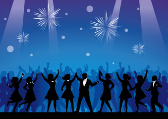 Happy people are dancing in the club. It's a Eve party. Celebrating the New Year, joy, festivity.