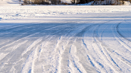 Road on Ice, Ice Breaker for Cars, Car tracks on ice, Background image, stub for design, selective focusing