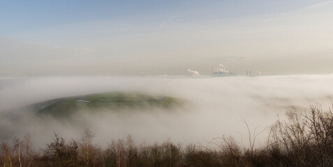 Obraz na płótnie Canvas industrial landscape on a foggy morning
