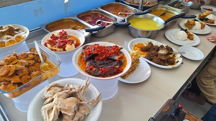 Warung Nasi Padang, Padang rice curry one of the most famous meals to be associated with Indonesia,...