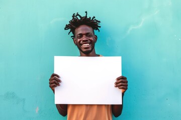 young black man holding blank print sign