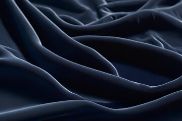 Obraz premium A luxurious blue upholstery fabric with wave patterns