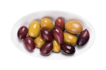 Kalamata and green olives with pit, pickled whole, large Greek table olives, in a white oval bowl. Purple fruits picked when ripe, and green olives picked while still unripe, both preserved in brine.