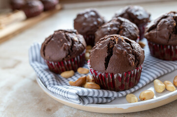 Chocolate muffins with peanuts