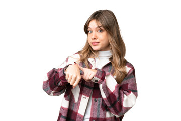 Fototapeta premium Young girl over isolated chroma key background making the gesture of being late