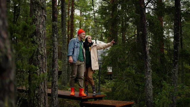 Pair Of Tourists In Nature, Resting In Camping In Pine Forest, Eco-Tourism And Traveling