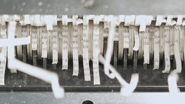 Shredded documents video sequence, secret information, lorem ipsum. Secure disposal of sensitive data. Valuable private information is destroyed. Protection from identity theft, fraud, security risks.