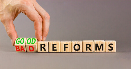 Good or bad reforms symbol. Concept words Good reforms Bad reforms on beautiful wooden blocks....