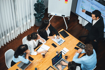 Project manager planning schedules for business task at meeting room, Gantt chart software show on...