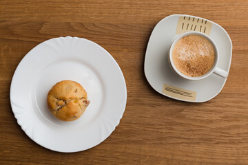 Fresh muffin with coffee for breakfast