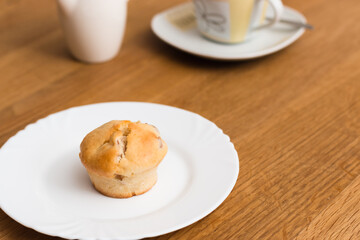 fresh muffin with coffee and milk for breakfast