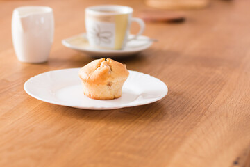 fresh muffin with coffee and milk for breakfast