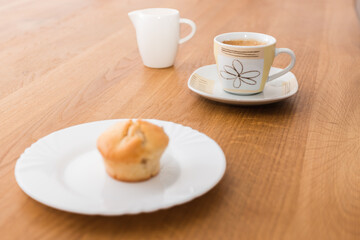 fresh muffin with coffee and milk for breakfast