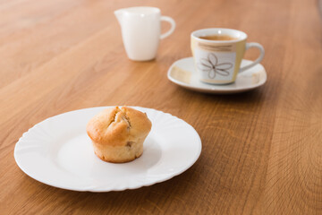 fresh muffin with coffee and milk for breakfast