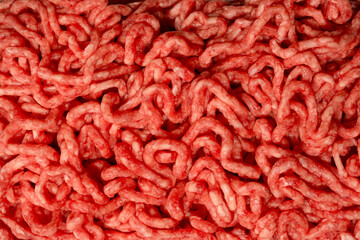 Raw minced beef close-up, top view.
