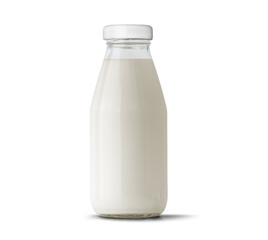 Milk in glass bottle isolated on white