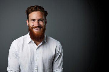 Obraz premium Portrait of redhead man with beard and white shirt