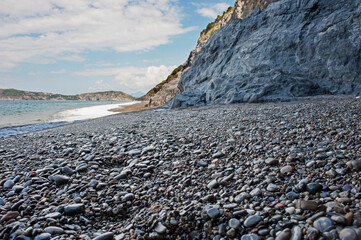 Astonishing trait of coast with both shingled and sandy beaches among cliffs. Marina di Camerota, Salerno, Italy.