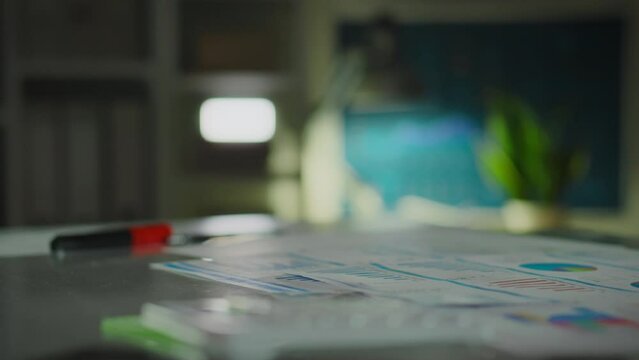 Against the backdrop of a stylish office, colleagues are congratulated on the successful completion of a business meeting. A handshake is a symbol of a concluded deal between business partners