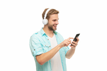 Audio playlist. Man in headphones. Man in headphones choosing playlist of mp3 on phone. Man using smart phone application isolated in white. Listening music with phone. Music lifestyle. Communication