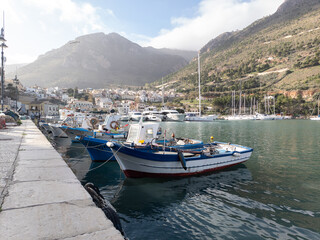 Fototapeta na wymiar Le barche antiche ormeggiate nel porto di Castellammare del Golfo